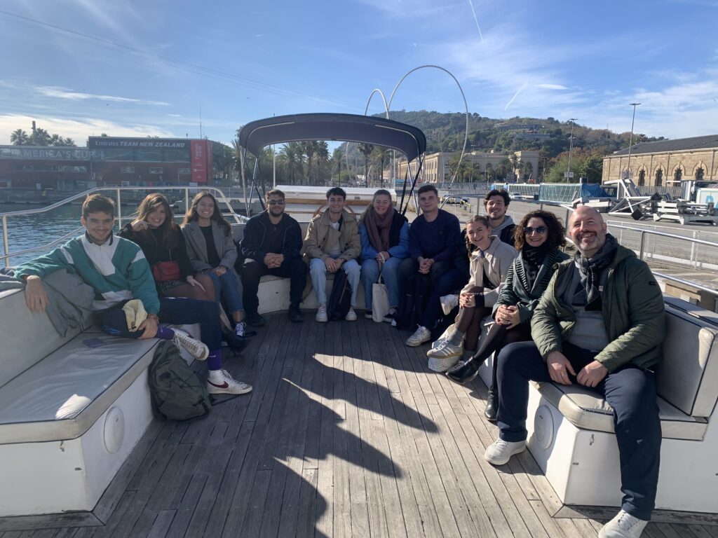 During the Workshop week, students also visited the Port of Barcelona and its
environment, having the opportunity to observe the operations first-hand, the traffic, the
infrastructure and the operators placed in the Port, through a boat tour with explanations.